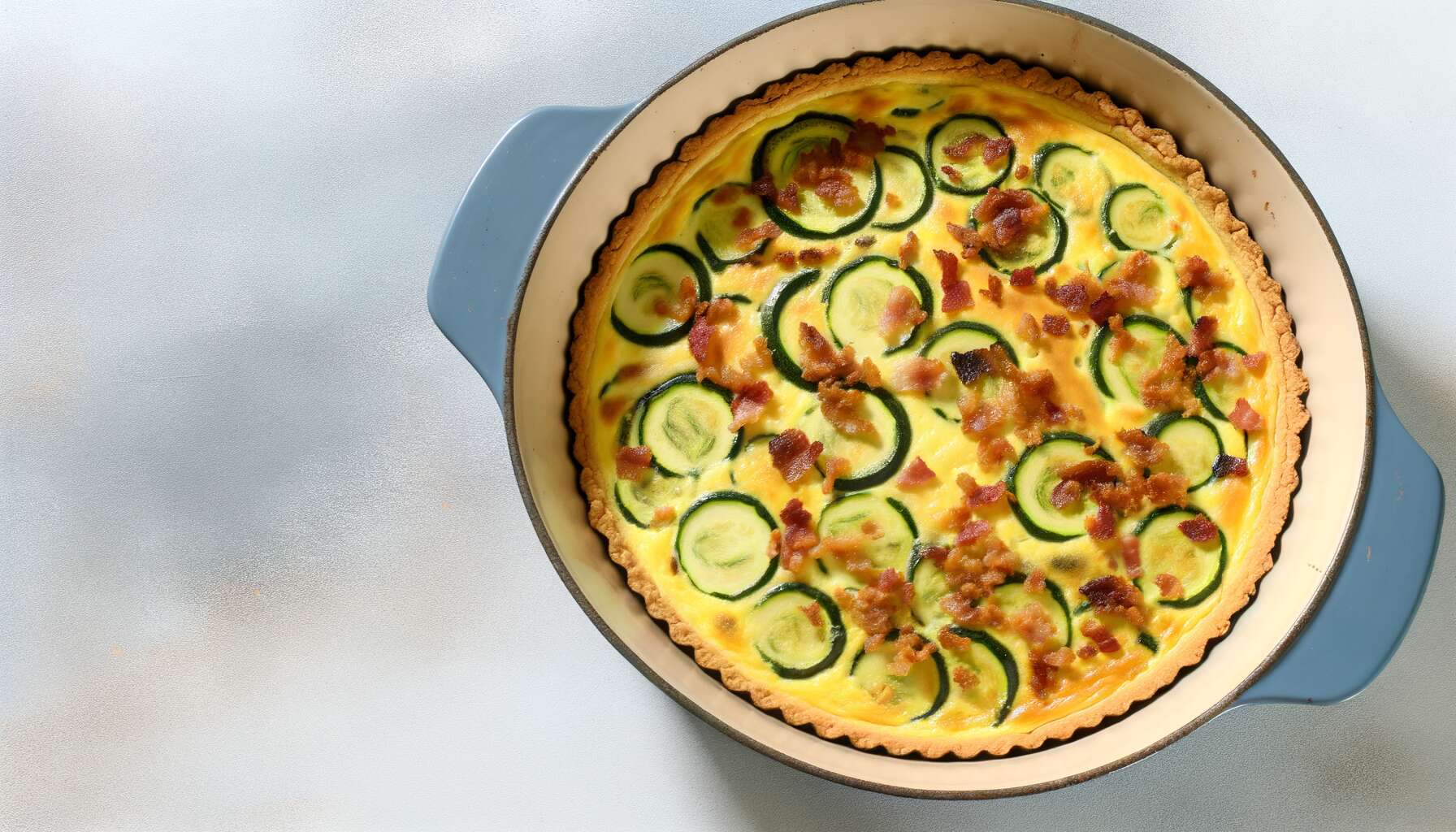 Tarte aux courgettes et lardons : une entrée gourmande qui ravira vos invités